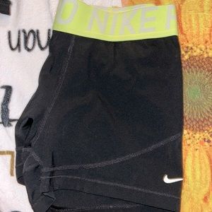 green band nike pros size large